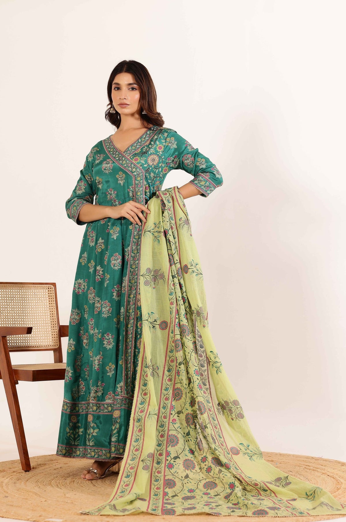 Vibrant Elegance: Green Angrakha Dress with Floral Dupatta and Tassel Details
