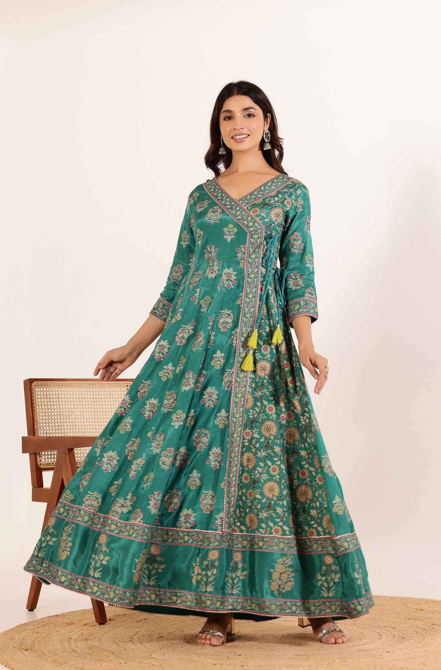 Vibrant Elegance: Green Angrakha Dress with Floral Dupatta and Tassel Details