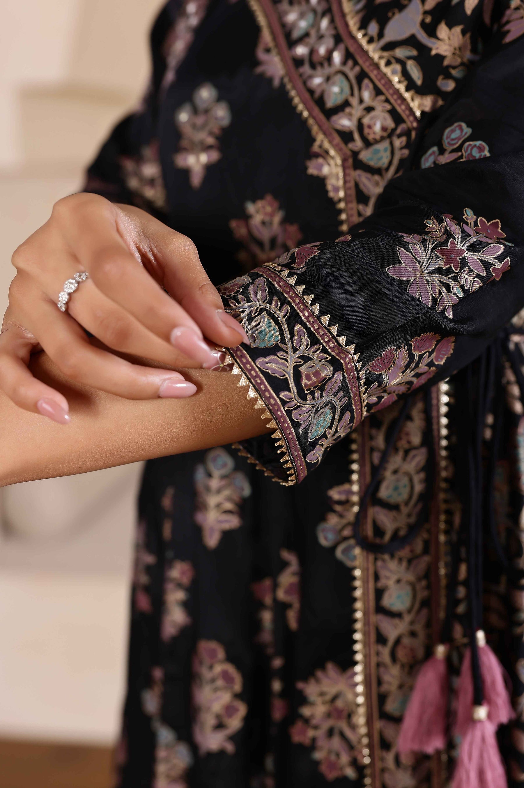 Radiant Elegance: Black Angrakha Dress with Floral Dupatta and Shimmering Accents