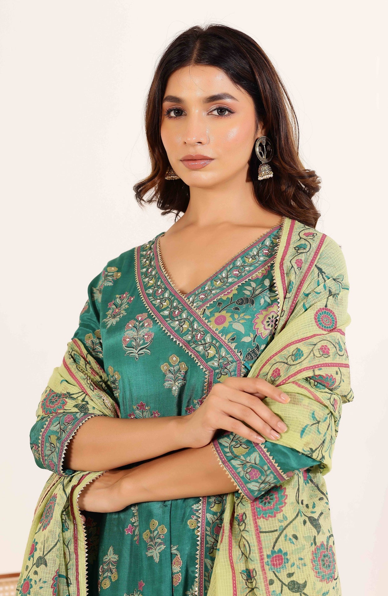 Vibrant Elegance: Green Angrakha Dress with Floral Dupatta and Tassel Details