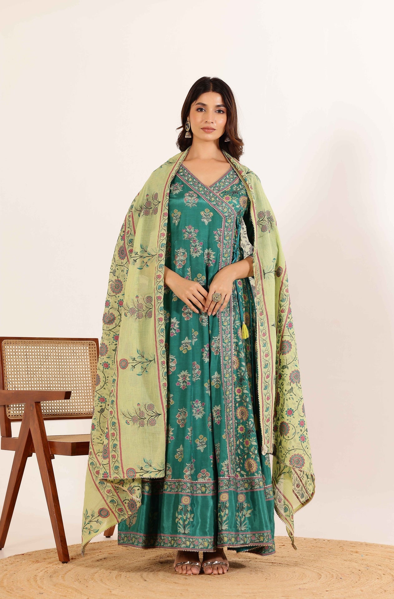 Vibrant Elegance: Green Angrakha Dress with Floral Dupatta and Tassel Details