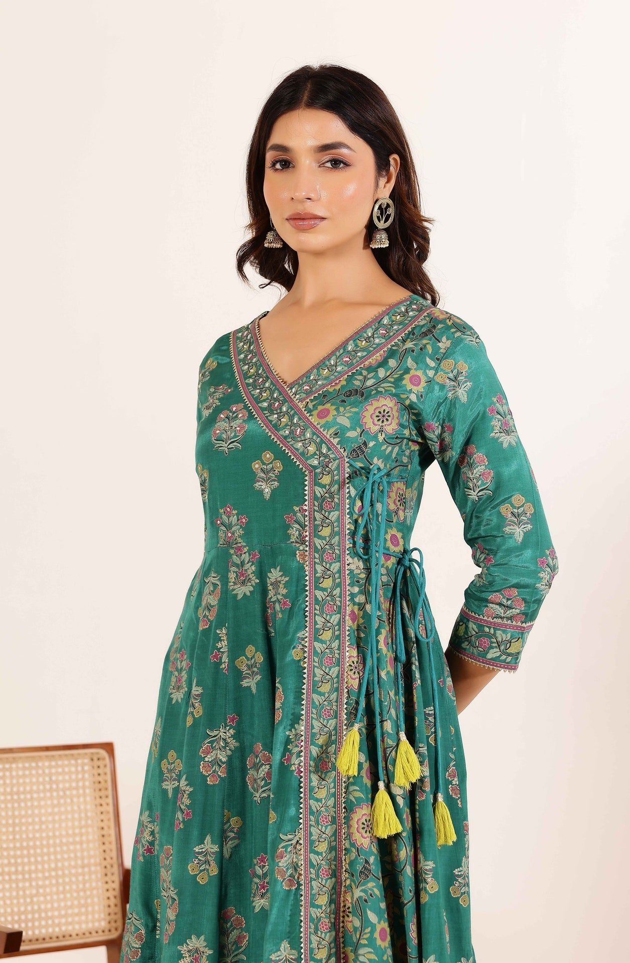 Vibrant Elegance: Green Angrakha Dress with Floral Dupatta and Tassel Details